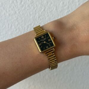 Gold Wristwatch with Black Square Face